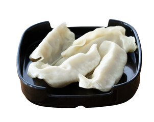 fresh raw Dumpling. sliced on square plate isolated on white background, shabu, hot pot ingredients