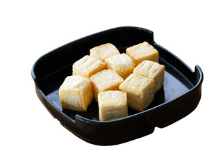 fresh raw tofu sliced on square plate isolated on white background, shabu, hot pot ingredients