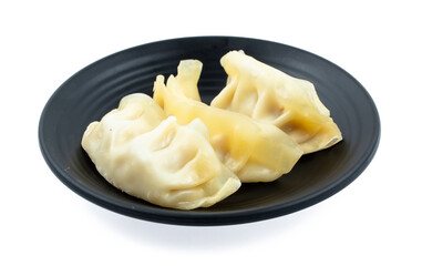 fresh raw Dumpling sliced on square plate isolated on white background, shabu, hot pot ingredients