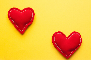 red heart valentine gift holiday romance yellow background