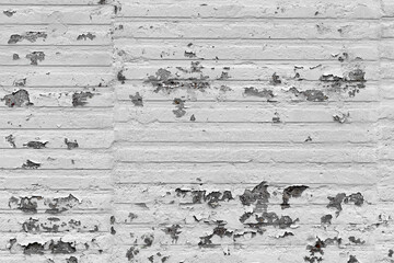The Walls and backgrounds Old cement walls with black stains on the surface caused by moisture. Peeling wall surface with cracks and scratches, old rough gray cement wall surface for the background.