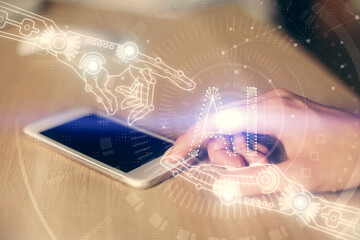 Double exposure of technology sketch hologram and woman holding and using a mobile device. Ai concept