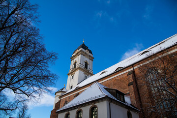 Fuerstenwalde, Brandenburg, Germany - January 30, 2021 Roof and facade of St. Mary's Cathedral