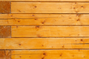 Naklejka premium Wooden beam at home. Close-up. Background. Texture.