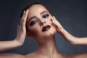 Beautiful portrait of woman with smokey eyes make-up