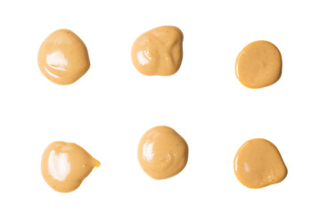 Mushroom sauce splashes isolated on white background.