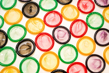 Colorful condoms background.