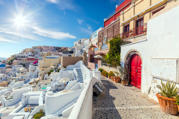Famous Oia, Santorini, Greece. A picturesque view of the traditional Santorini  houses on a small street