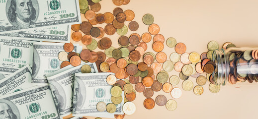 Dollar bills and pile coins in the bottle, Money growing concept and the goal success.