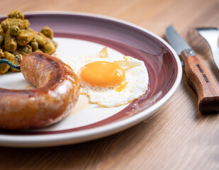 fried eggs with sausage