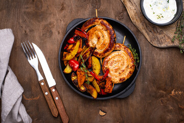 Baked chicken sausages with vegetables