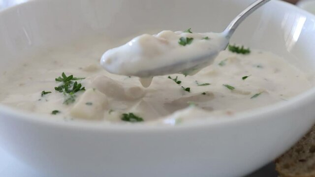 Eating a Bowl of Clam Chowder