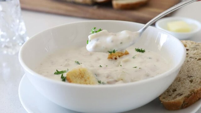 Eating a Bowl of Clam Chowder