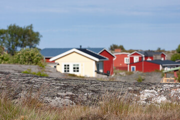 Fototapeta na wymiar Colorful wooden houses on remote island of Utö, Finland, Northern Europe 