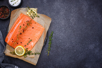 Raw salmon fillet with herbs