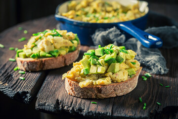 Healthy and fresh fried eggs with chive and avocado - obrazy, fototapety, plakaty