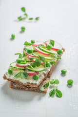 Healthy sandwich with creamy cheese on crispy bread
