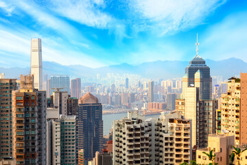 Fototapeta na wymiar Hong Kong cityscape. Aerial view of Hong Kong modern skyscrapers with blue sky