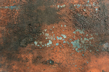 Fire cracked red paint texture. Rust on metal