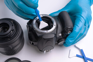 Cleaning the matrix of a SLR camera. Camera sensor cleaning tool