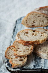 Traditional French bread baguette on white