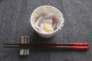 Fermented soybeans Natto in paper cup and chopstics
