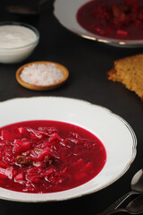 A plate with Ukrainian national dish - borsch