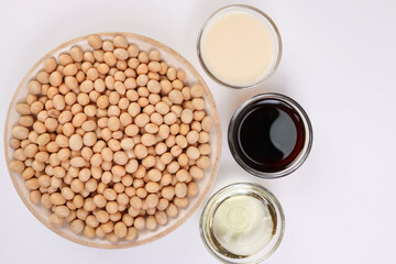 Soyabean sauce oil milk in mini glass bowls on white background