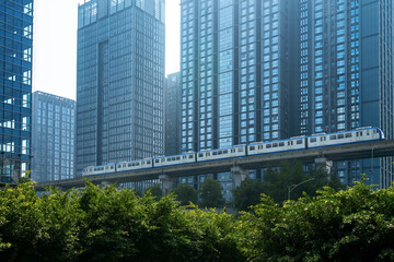 Fototapeta na wymiar Light rail runs on bridges at high speed in Chongqing, China