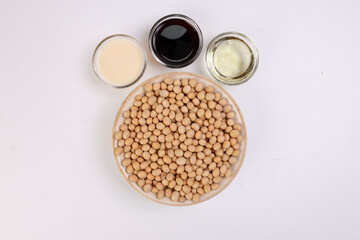 Soyabean sauce oil milk in mini glass bowls on white background