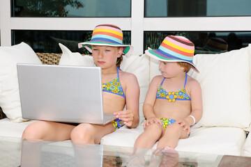 Beautiful girls with laptop