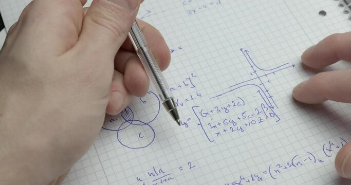 Writing math exercise closeup footage