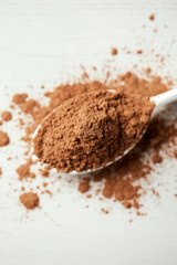 ceramic spoon with carob powder