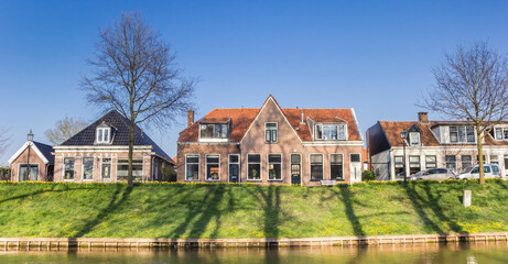 Fototapeta na wymiar Panorama of historic houses at the canal of Steenwijk, Netherlands
