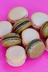 Homemade pink raspberry and chocolate macaron cookies