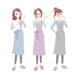 エプロン姿の笑顔の女性達（全身）