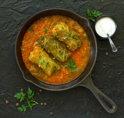 Ukrainian traditional dish with cabbage and stuffed cabbage. Selective focus.