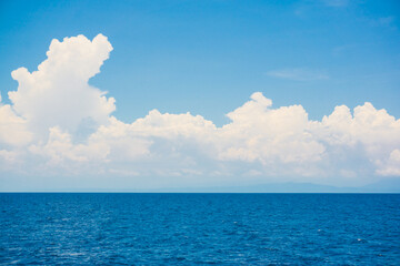 Naklejka na ściany i meble Deep blue sea with sky cloud nature landscape