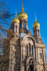 Fototapeta na wymiar View towards the Russian Orthodox Chapel in Wiesbaden / Germany on the Neroberg in winter