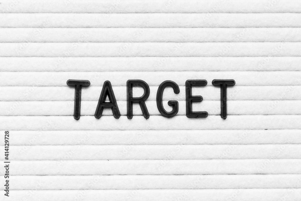 Wall mural Black color letter in word target on white felt board background