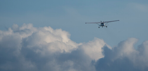Fototapeta na wymiar airplane above the cloud after takeoff