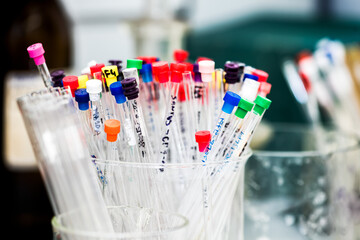 Sample tubes for NMR spectoscopy method, scientific research background, colorful tips on tubes, selective focus
