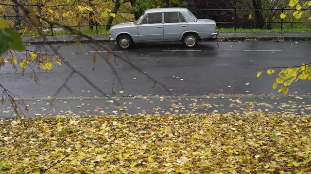 Lada 2101, socialist retro car parking on the street.