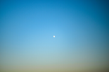 The moon high on the sky