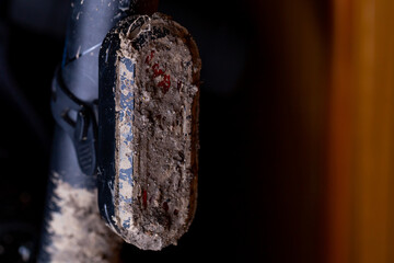 Extremely muddy and dirty bicycle rear light