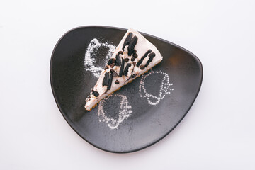 Top view photo of tart with chocolate biscuits.