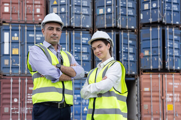 Caucasian Workers Standing with Arm Crossed in front of the Shipping Container