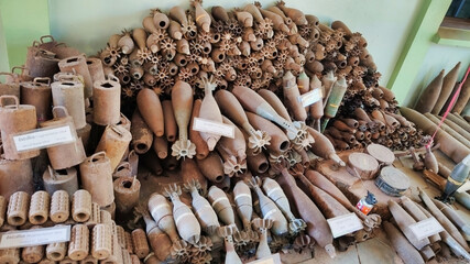 View of old rusty shells, mines and bombs. Phumi Khna: Cambodia Landmine Museum.  South-East Asia	
