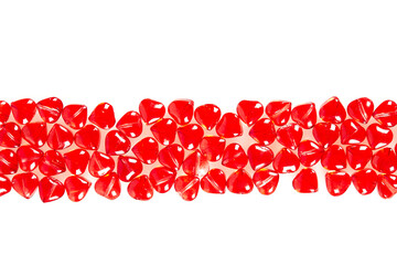 read heart-shaped beads isolated on white background