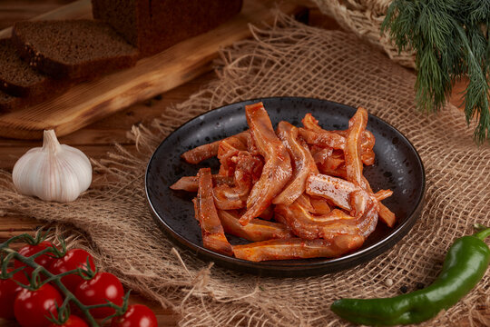 Korean style pork skins on wooden background